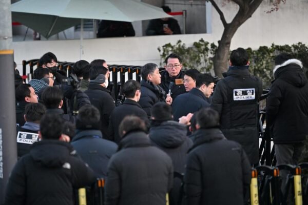 South Korean investigators abandon effort to detain impeached president after hours-long standoff