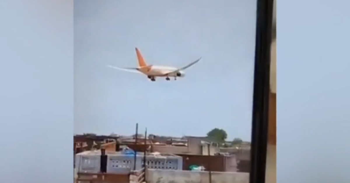 Video shows Air India plane descending over Ahmedabad, crashing behind buildings